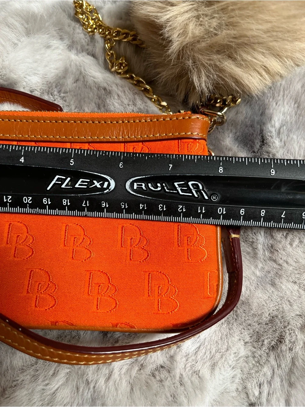 Dooney & Bourke Orange Signature Logo Wristlet with Gold Chain and Pom